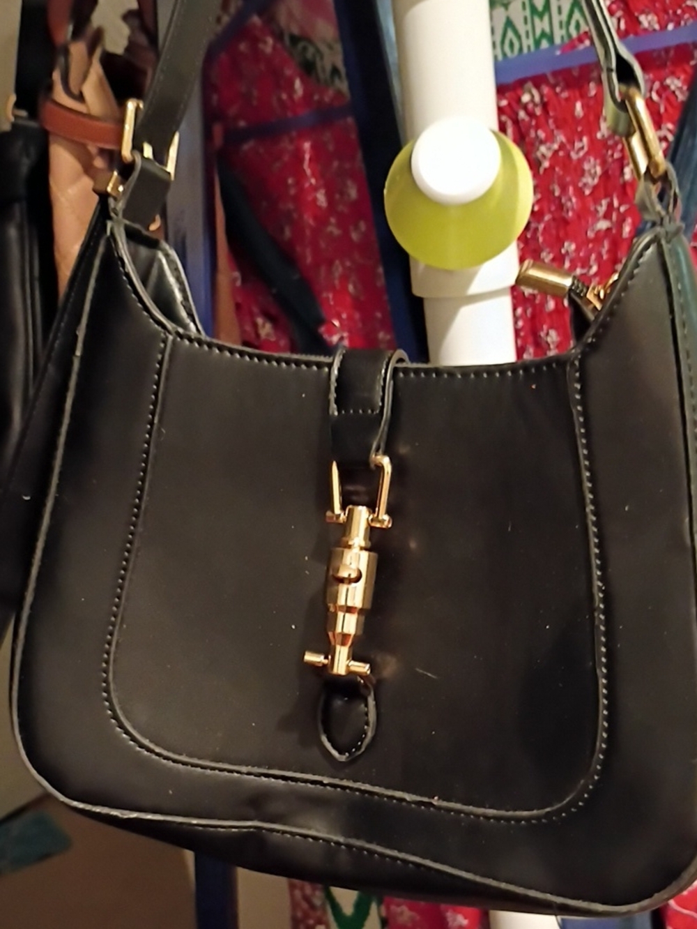 Elegant Black Shoulder Bag with Gold Hardware